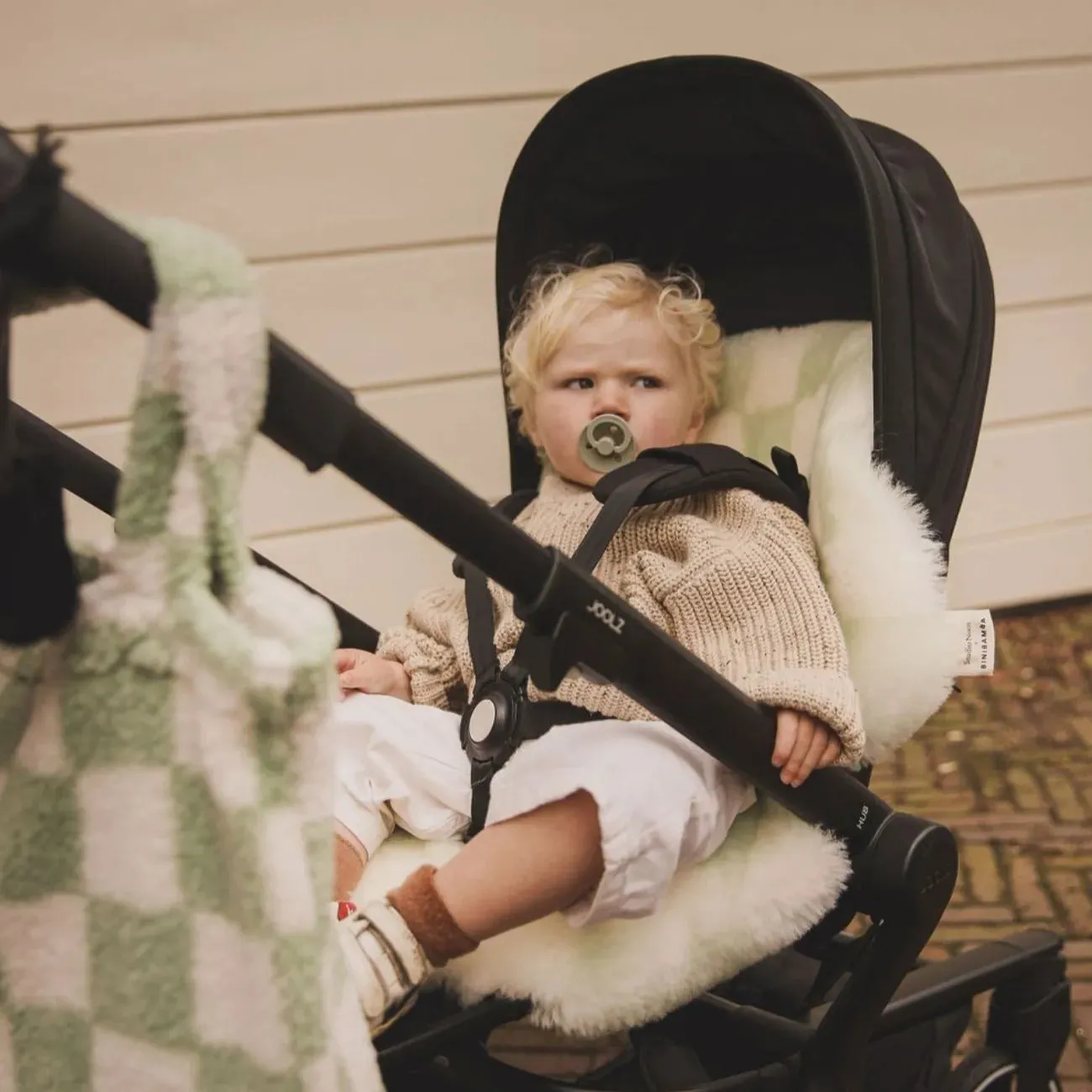 Studio Noos Checkerboard Sheepskin Snuggler (Pistachio)